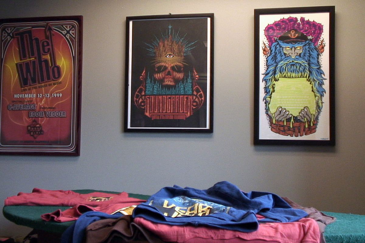 Concert posters line the walls of Jeremy "Crash" Crowley