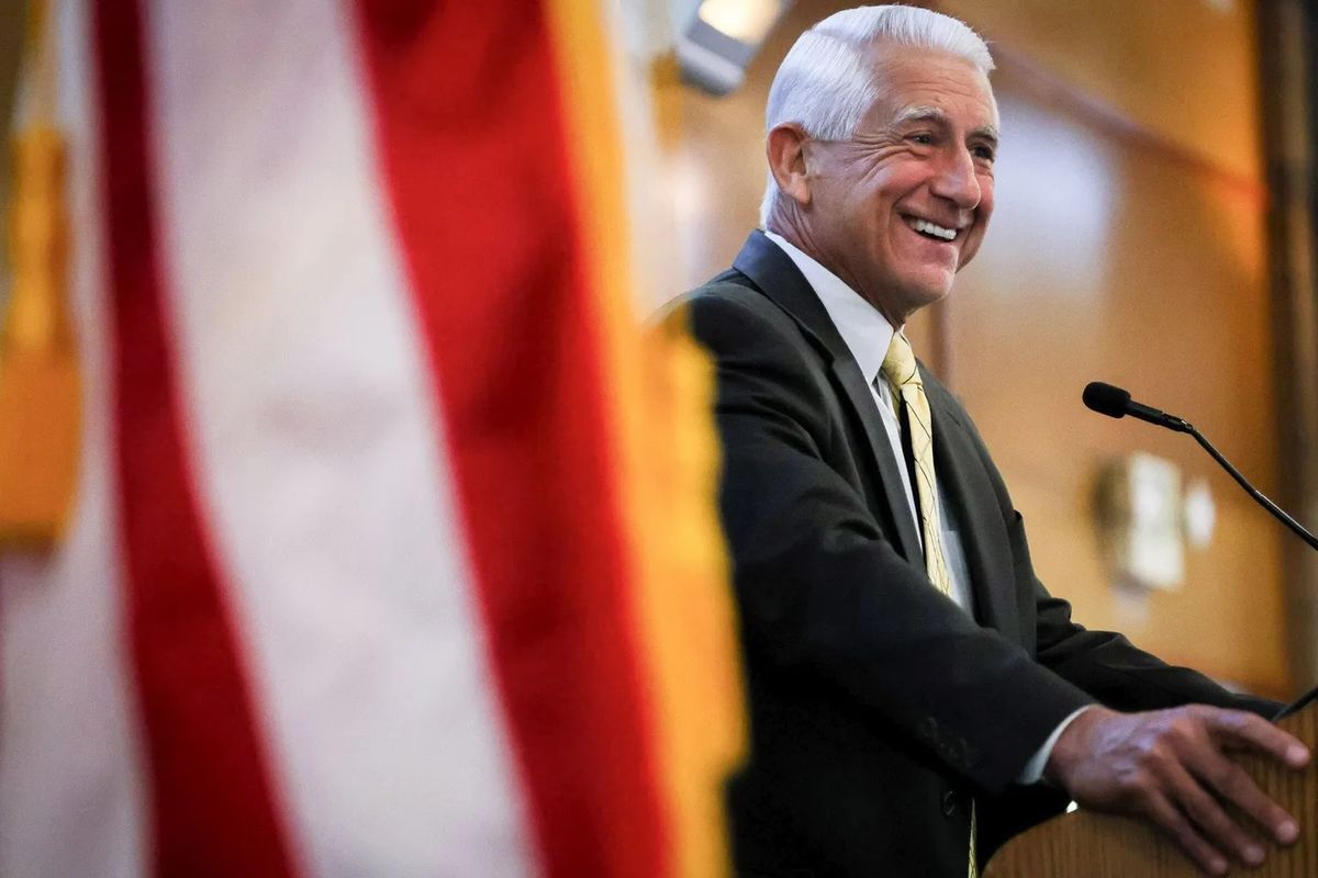 Dave Reichert greets guests during a watch party for the Washington Primary Election hosted by Pierce County Republicans at Pioneer Park Pavilion in Puyallup on Tuesday.  (Audrey Richardson/Seattle Times)