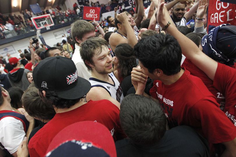 St. Mary's Gaels guard Matthew Dellavedova, center, celebrates with fans after beating Gonzaga 83-62 in an NCAA college basketball game on Thursday, Jan. 12, 2012, in Moraga, Calif. (Tony Avelar / Fr155217 Ap)
