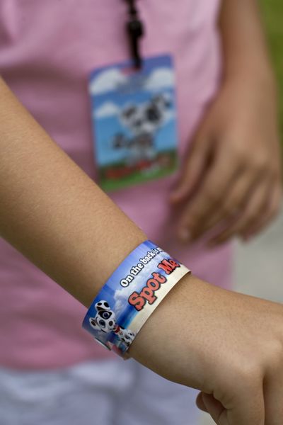 Jamie Rayko, of Celebration, Fla., says losing her 7-year-old daughter at an amusement park led her to create Spot Me ID, a product that helps families reunite in busy places. The bracelets, lanyards and temporary tattoos can be customized with a phone number. McClatchy Tribune (McClatchy Tribune / The Spokesman-Review)