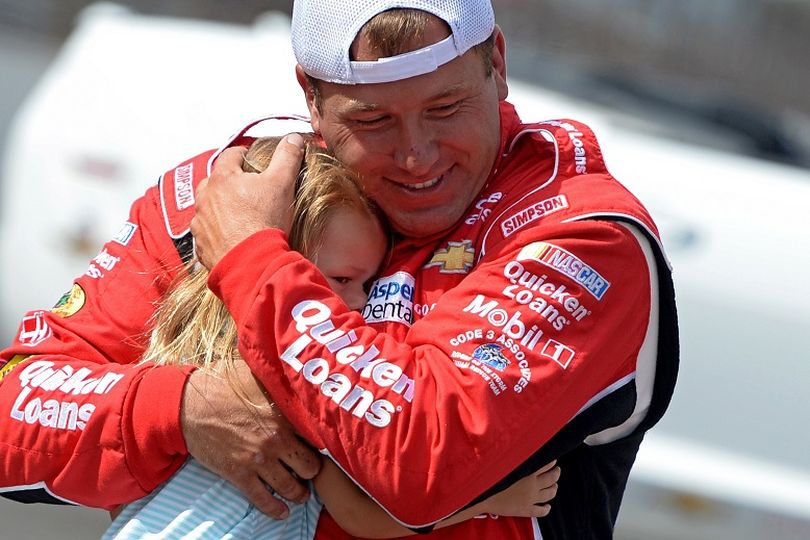 INDIANAPOLIS, IN - JULY 28: Ryan Newman, driver of the #39 Quicken Loans/The Smurfs Chevrolet, celebrates with his daughter Brooklyn Sage after winning the NASCAR Sprint Cup Series Samuel Deeds 400 At The Brickyard at Indianapolis Motor Speedway on July 28, 2013 in Indianapolis, Indiana. (Photo Credit: Patrick Smith/Getty Images) (Patrick Smith / Getty Images North America)