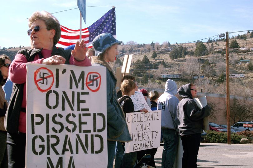 This Feb. 20, 2010 photo provided by the Blue Mountain Eagle via the East Oregonian shows protesters in John Day, Ore. A community hall in Eastern Oregon couldn't hold all of the local residents who showed up Friday, Feb. 26, 2010 to voice concern that a swastika-wearing white supremacist might move himself and his followers to the town of John Day. In a session streamed live on the local newspaper's Web site, one resident after the other was emphatic: The Aryan Nations was not welcome in their community. (Angel Carpenter / Blue Mountain Eagle Via The East)