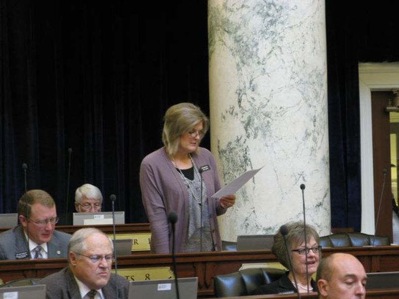 Sarah Bedkey, filling in for injured Rep. Scott Bedke, her husband, urges support Wednesday for SB 1110, the teacher merit pay bill. She said he husband long has been an advocate for pay for performance. (Betsy Russell)