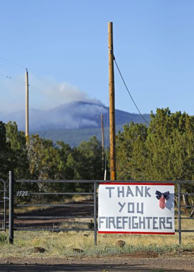 A sign thanks firefighters Sunday in Vernon, Ariz. (Associated Press)