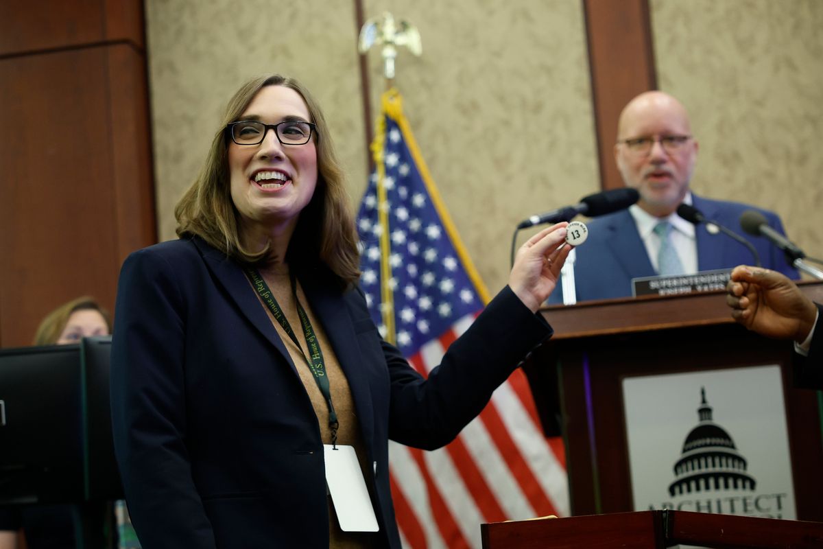 Above: U.S. Rep.-elect Sarah McBride, D-Del., picks during the New Member Orientation Room Lottery for office space at the U.S. Capitol on Thursday in Washington, D.C. Left: U.S. Rep. Nancy Mace, R-S.C., arrives for a House Republican caucus meeting at the U.S. Capitol on Tuesday in Washington, D.C.  (Kevin Dietsch)