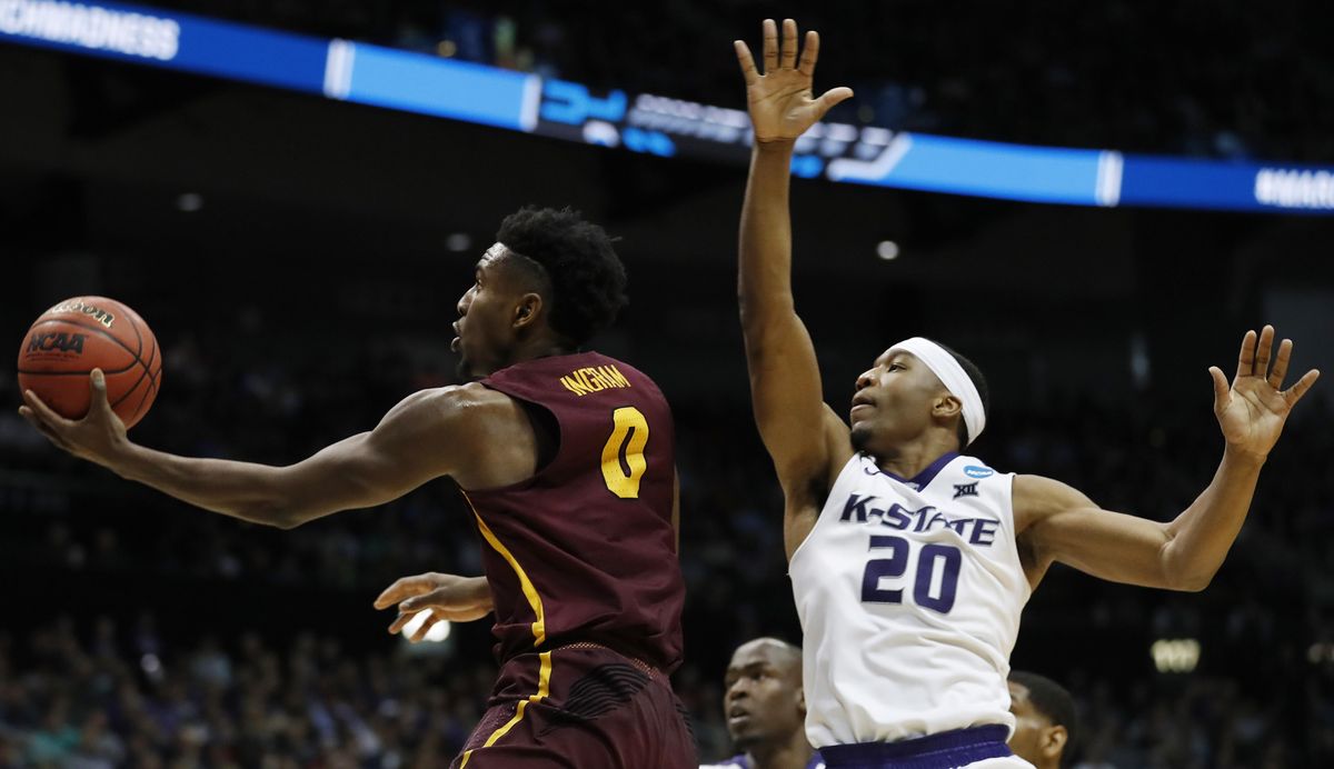 Loyola-Chicago guard Donte Ingram (0) heads tot he hoop against Kansas State forward Xavier Sneed (20) during the second half of a regional final NCAA college basketball tournament game, Saturday, March 24, 2018, in Atlanta. (David Goldman / AP)