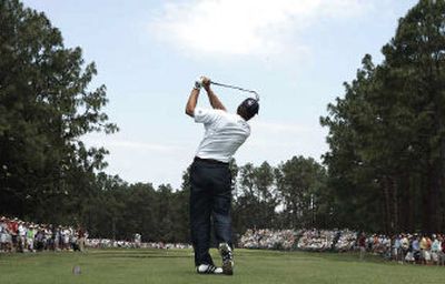 Retief Goosen tees off on the 15th hole Thursday on the way to a first-round, 2-under-par 68 at Pinehurst No. 2.
(Associated Press / The Spokesman-Review)