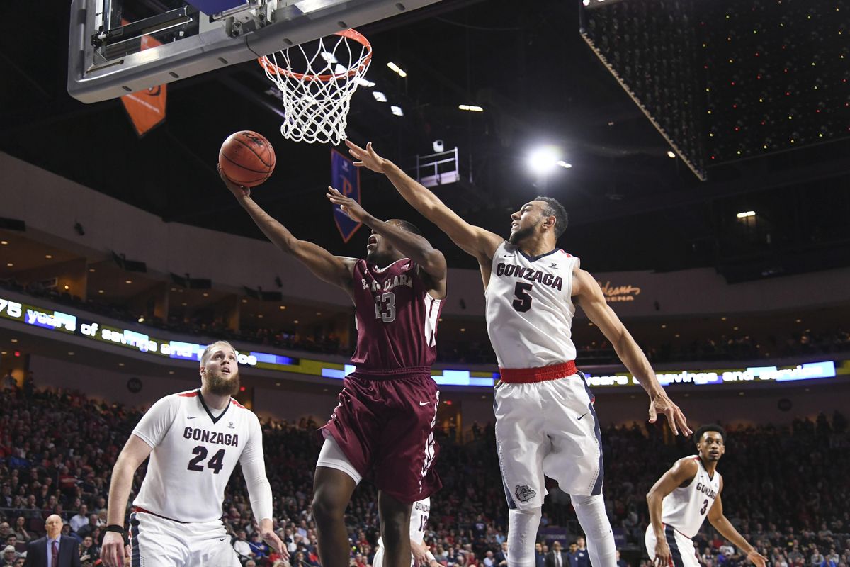 Gonzaga guard Nigel Williams-Goss (5) defends Santa Clara guard Jared Brownridge (23) at the rim in their WCC semi-final game, March 6, 2017, at Orleans Arena in Las Vegas. (Dan Pelle / The Spokesman-Review)