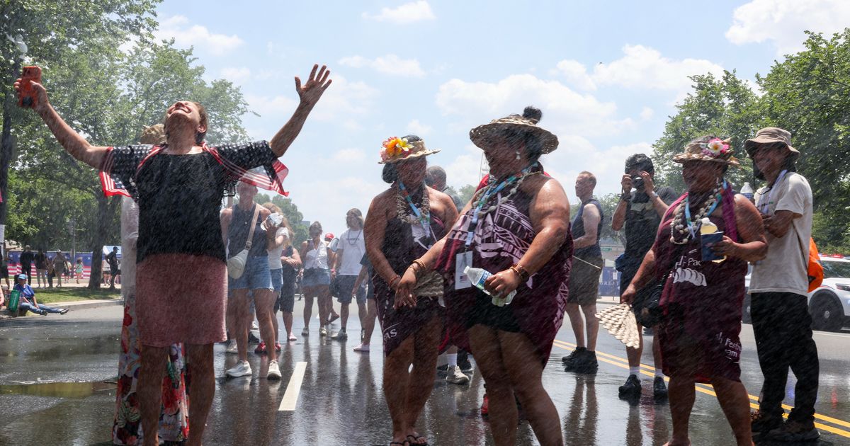 Peak of heat reaches mid-Atlantic as many records fall across East