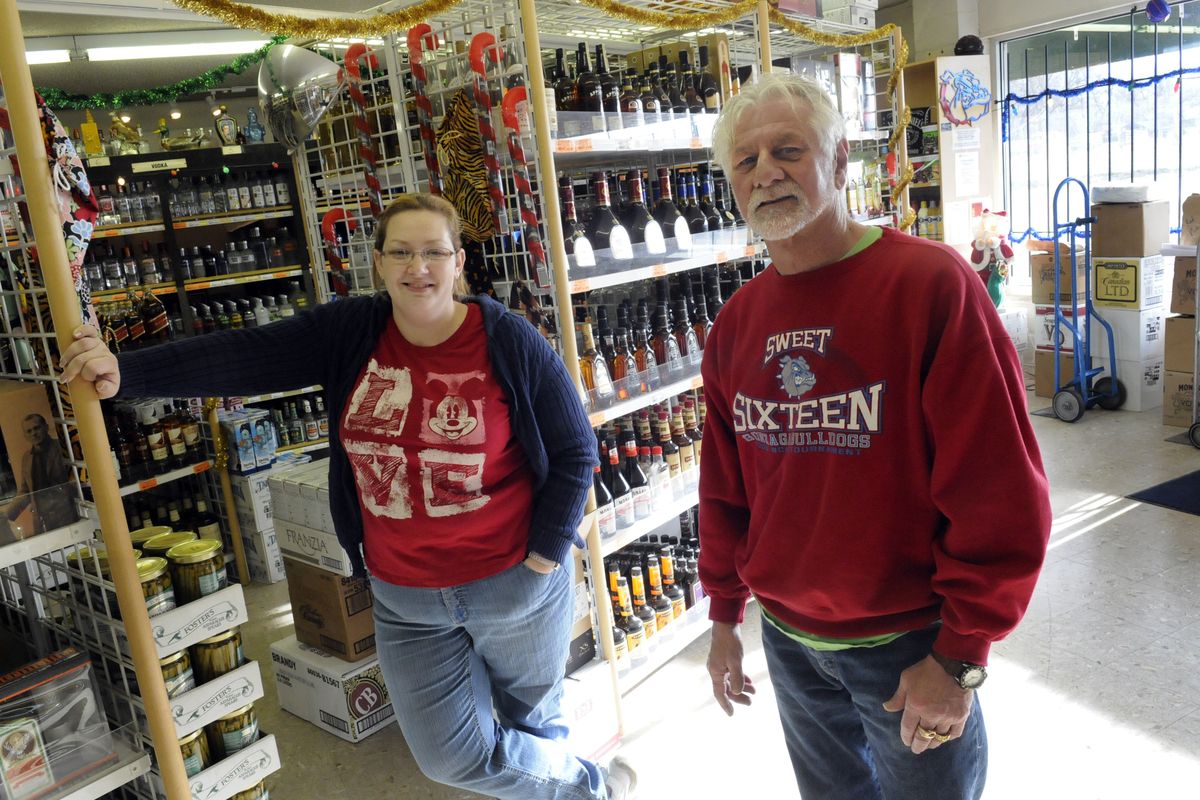 Greenacres Liquor Store owner Keith Peterson said he decided to keep his business of 25 years open in part because of his five employees. (J. Bart Rayniak)