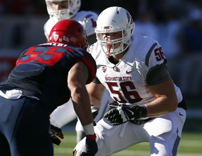 Washington State offensive lineman Joe Dahl (56), a graduate of University High, played 692 snaps this season and gave up just three sacks.