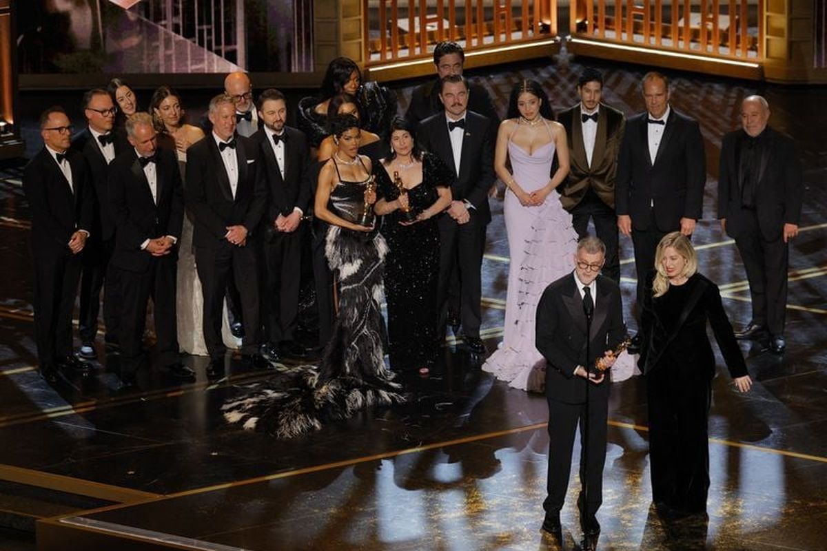 Director Paul Thomas Anderson, with cast and crew onstage to celebrate, accepts the Oscar for Best Picture for “One Battle after Another” during the 98th Academy Awards on Sunday in Hollywood, Calif.  (Reuters )