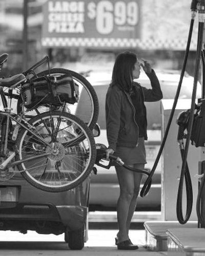 
A driver fills up at a Hess station in Collegeville, Pa., on Monday. Retail gasoline prices climbed to another record Monday — even adjusted for inflation, topping the record set in 1981. 
 (Associated Press / The Spokesman-Review)