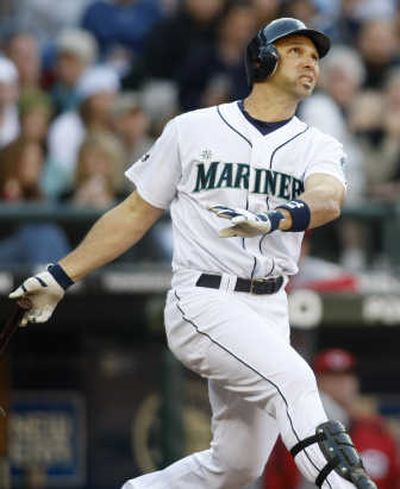 
Seattle's Raul Ibanez tracks his first-inning grand slam off Cincinnati starter Kyle Lohse on Saturday. Associated Press
 (Associated Press / The Spokesman-Review)