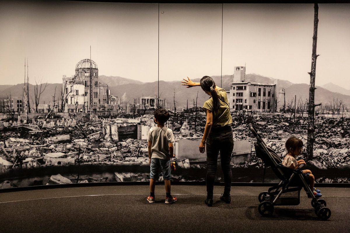 Visitors at Hiroshima Peace Memorial Museum view a large scale panoramic photograph on Aug. 5, 2022, of the aftermath of the atomic bomb attack in Hiroshima, Japan. Saturday marked the 78th anniversary of the atomic bombing of Hiroshima in which between 90,000 to 146,000 people were killed and the entire city destroyed in the first use of a nuclear weapon in armed conflict.  (Yuichi Yamazaki)