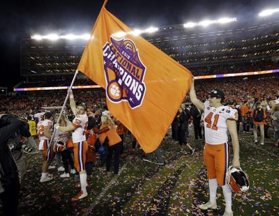 In this Jan. 7, 2019 photo, Clemson players celebrate after the NCAA college football playoff championship game against Alabama in Santa Clara, Calif. (David J. Phillip / Associated Press)