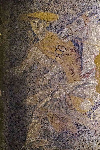 The Greek god Hermes is depicted as the conductor of souls to the afterlife in this mosaic in an ancient Greek burial chamber in Amphipolis, northern Greece. (Associated Press)