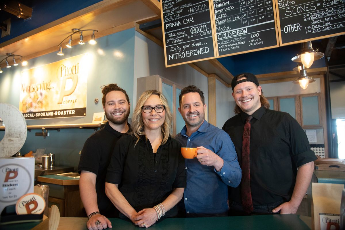 The Pitotti family, from left, Emilio, Angela, Chris and Lucas, operate Pitotti Coffee shop in north Spokane’s Garland District.  (Jesse Tinsley/The Spokesman-Review)