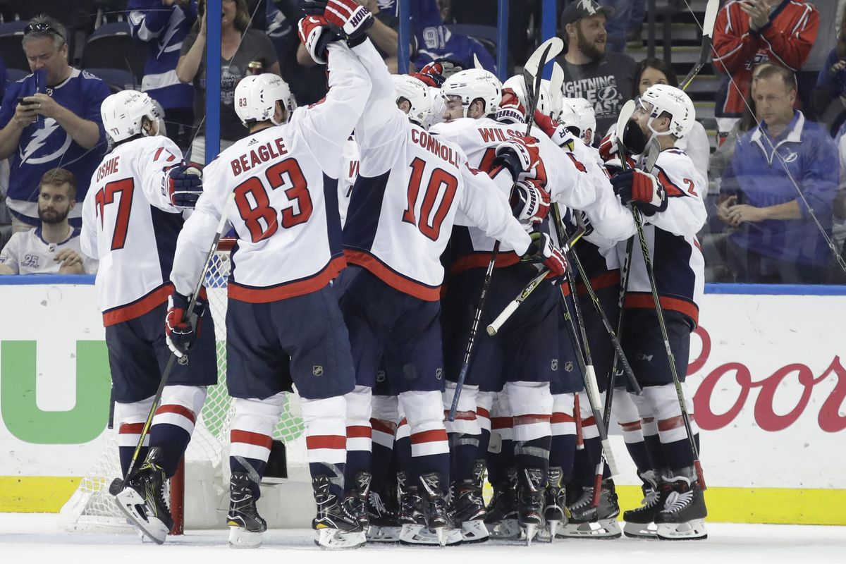 Washington Capitals celebrate after defeating the Tampa Bay Lightning 4-0 in Game 7 of the NHL Eastern Conference finals hockey playoff series Wednesday, May 23, 2018, in Tampa, Fla. (Chris O