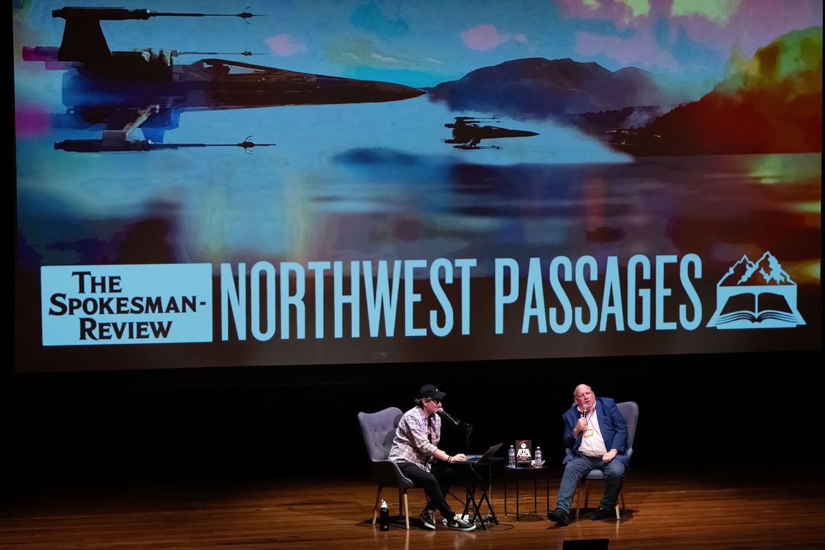 Spokesman-Review Editor Rob Curley, on left, has a conversation with documentary director/writer Steve Kozak, about his book “A DISTURBANCE IN THE FORCE - How and Why the Star Wars Holiday Special Was Made,” Saturday, Dec. 16, 2023, at the Myrtle Woldson Performing Arts Center.  (COLIN MULVANY)