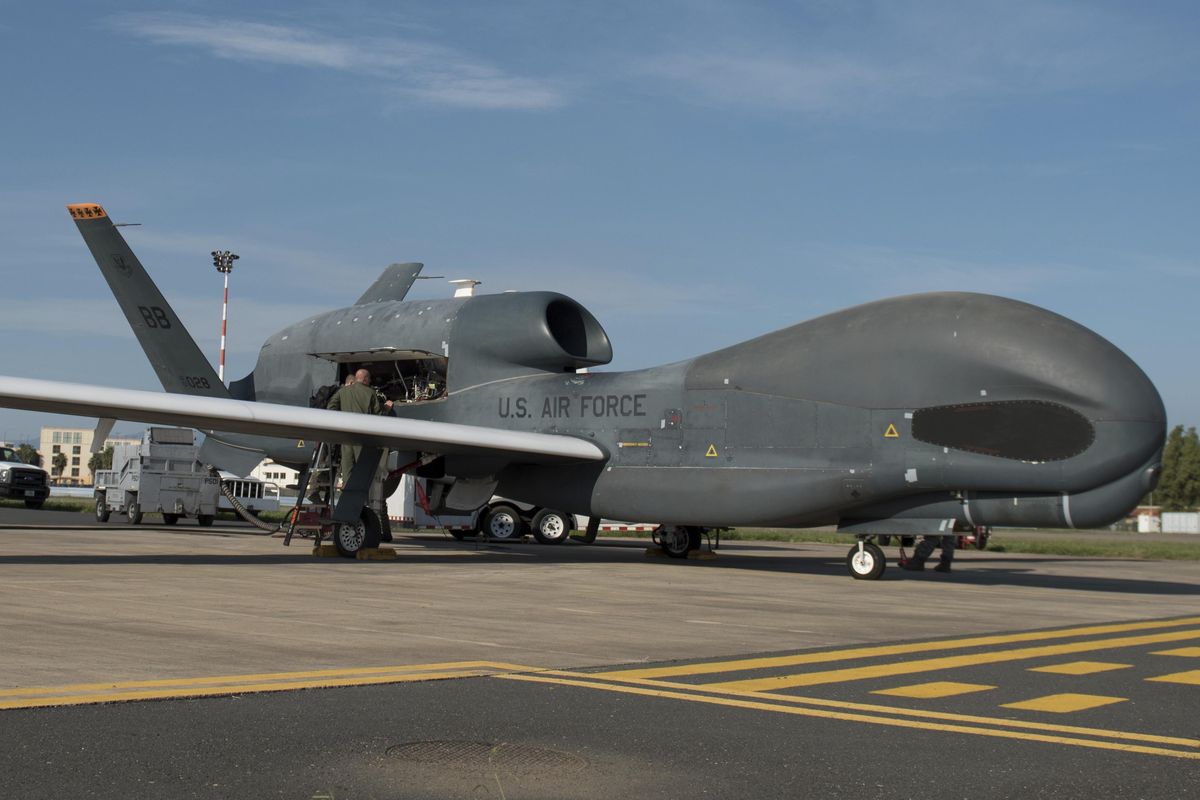 In this Oct. 24, 2018, photo released by the U.S. Air Force, members of the 7th Reconnaissance Squadron prepare to launch an RQ-4 Global Hawk at Naval Air Station Sigonella, Italy. Iran