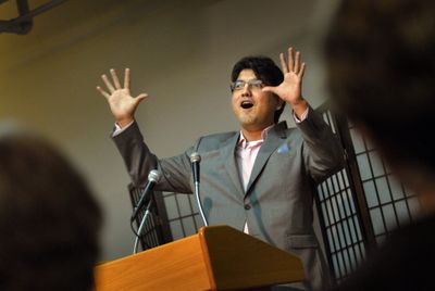 Author Sherman Alexie delights the crowd at Auntie’s Bookstore during a reading in Spokane.  (File / The Spokesman-Review)
