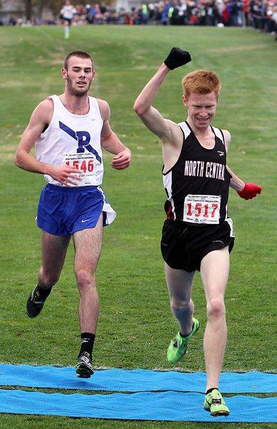NC’s Tanner Anderson edges Seattle Prep’s Joe Hardy for the 3A individual title. (Associated Press)