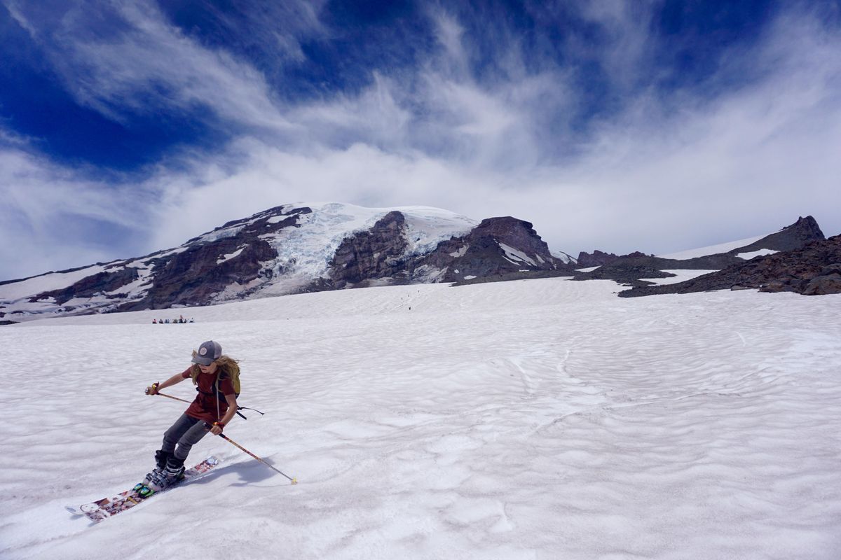 Owen Page carves a turn down a Mount Rainier snowfield in August 2017 to bag his ninth consecutive month of skiing. (TR PAGE / TR PAGE PHOTO)