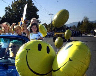
Participants in the 2004 Valleyfest parade wave to the crowd. This year's event will feature more than 130 booths featuring nonprofit organizations, entertainers arts and crafts, and food.
 (File/ / The Spokesman-Review)