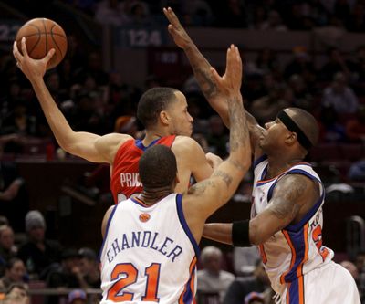 Detroit’s Tayshaun Prince looks for help against New York on Sunday.  (Associated Press / The Spokesman-Review)