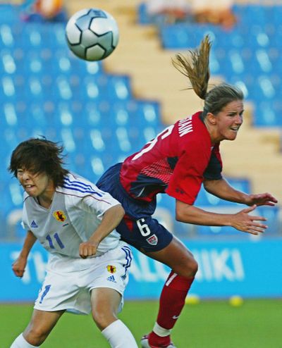 Associated Press Brandi Chastain, right, seen here during the 2004 Olympics, is playing in the new Women’s Professional Soccer league. (File Associated Press / The Spokesman-Review)