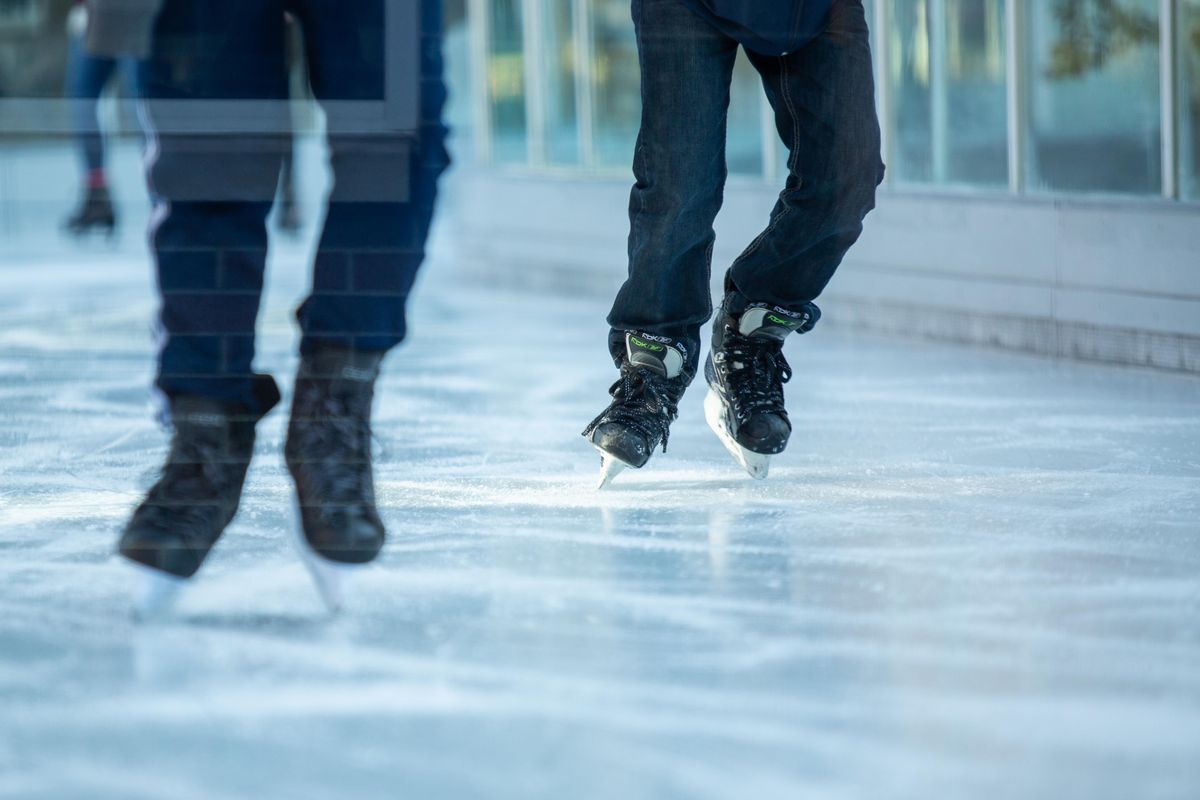 Ice skaters zip around the Numerica Skate Ribbon in Riverfront Park on Saturday, Nov. 17, 2018, the first day of the skating season. (Libby Kamrowski / The Spokesman-Review)