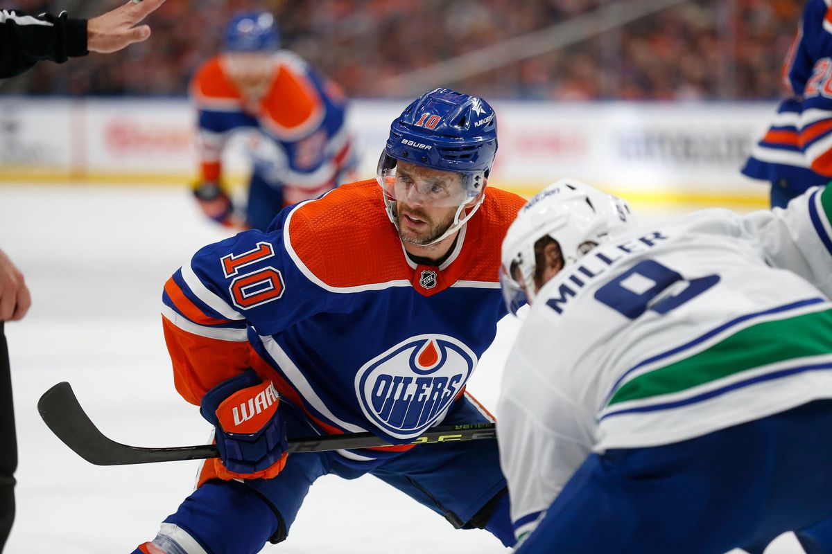 Edmonton’s Derek Ryan faces off against Vancouver’s J.T. Miller during the second round of the Stanley Cup playoffs at Rogers Place on May 14 in Edmonton, Alberta. (Getty Images)