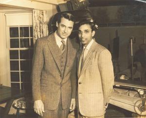 Pria Anand’s grandfather, Ravi Prakash, with movie star Cary Grant, left, on the set of “Mr. Blandings Builds a Dream House” at RKO studios in the United States in 1947. (Courtesy of Pria Anand)