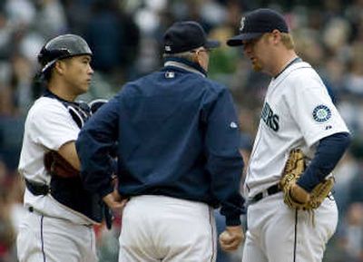 
The overall health of closer J.J. Putz, right, is concerning.Associated Press
 (Associated Press / The Spokesman-Review)