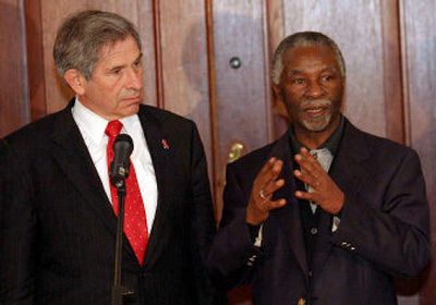 
New World Bank chief Paul Wolfowitz, left, meets with South African President Thabo Mbeki at a news conference in Pretoria, South Africa, on Saturday. 
 (Associated Press / The Spokesman-Review)