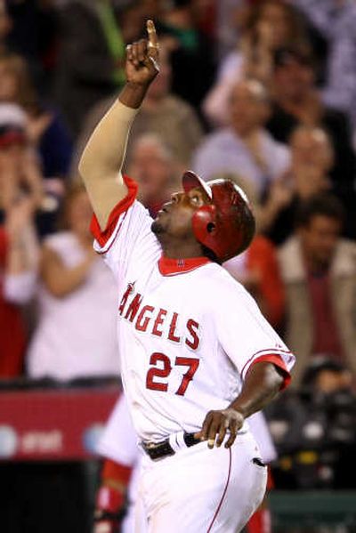 
Vladimir Guerrero made his point in the fourth, hitting a two-run homer for Los Angeles. Associated Press
 (Associated Press / The Spokesman-Review)