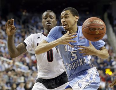 North Carolina's Marcus Paige and the Tar Heels defeated Louisville. (Associated Press)