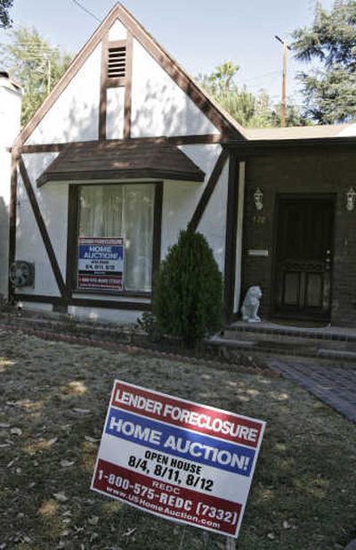 
A foreclosed house in Glendale, Calif. Analysts say big and small banks with a more traditional lending approach could grab market share as overextended rivals go belly-up.Associated Press
 (Associated Press / The Spokesman-Review)