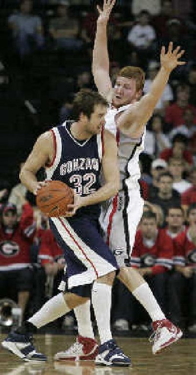 
Georgia forward Steve Newman pressures GU's Sean Mallon. 
 (Associated Press / The Spokesman-Review)