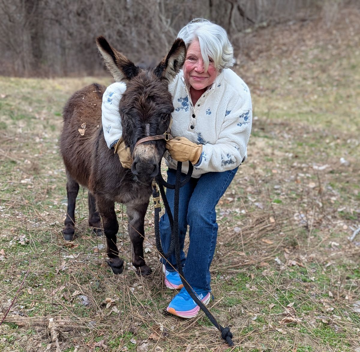 Deirdre Carter reunited with her donkey, Murty, after he went missing in the woods for two days. (Darren Derby)