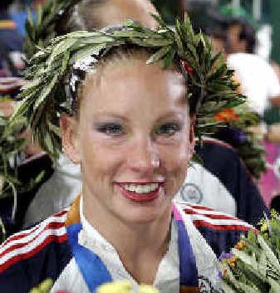 
Californian Tammy Crow smiles following the medal ceremony on Friday.
 (Associated Press / The Spokesman-Review)