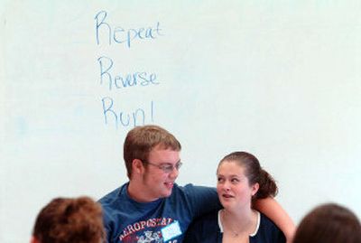 
Stephen Baxter and Ali Pollock perform a skit about  resisting pressure for sex during a PEAK mentor training session Friday at Post Falls High School. Students are taught to 