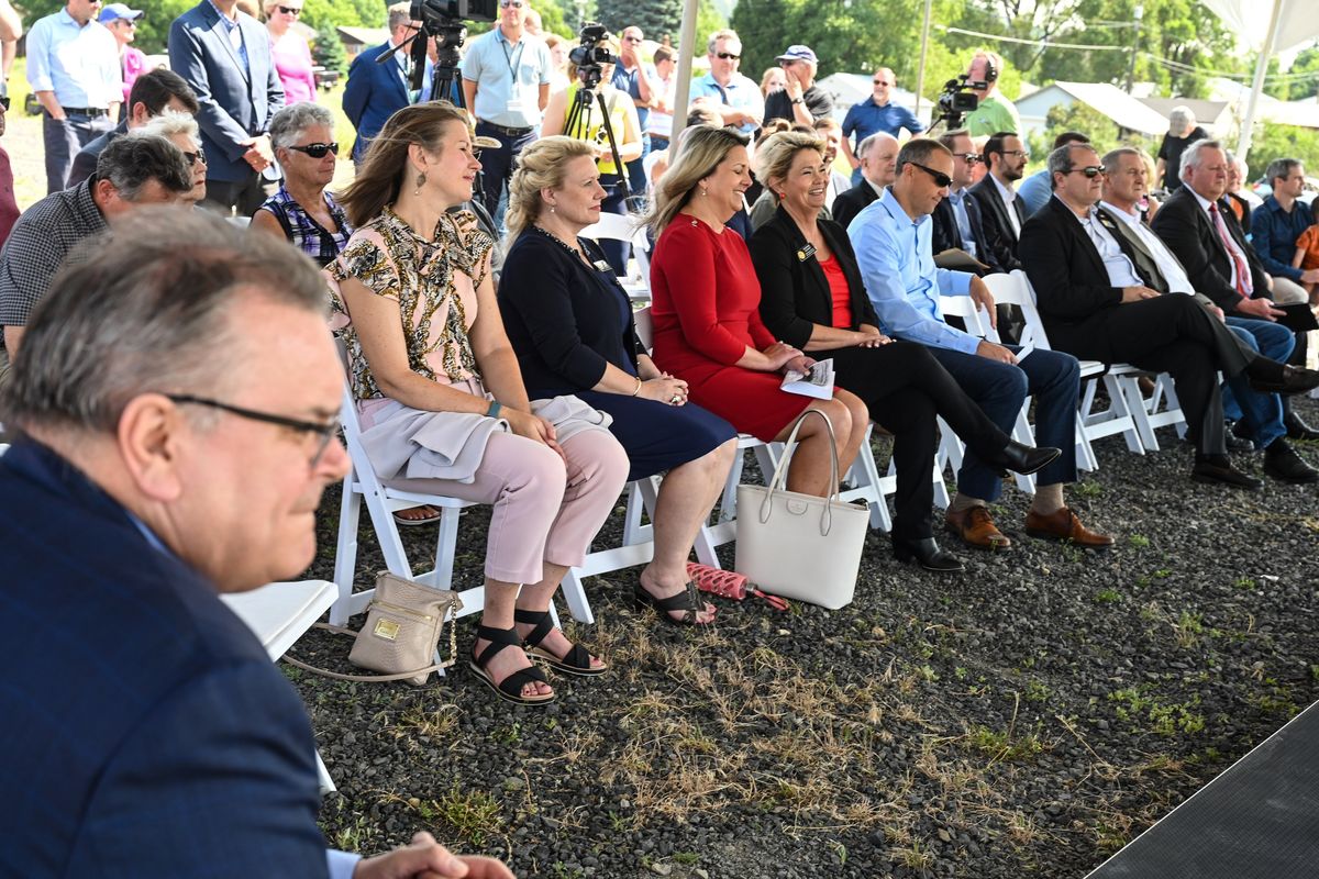 Elected officials and dignitaries listen to speakers near Marietta Avenue and Green Street during the groundbreaking on the North Spokane Corridor River Crossing, Tuesday, June 13, 2023, in Spokane. The next step will connect the project across the Spokane River.  (DAN PELLE/THE SPOKESMAN-REVIEW)