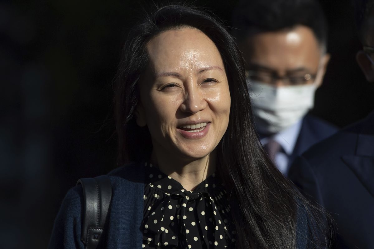 Meng Wanzhou, chief financial officer of Huawei, smiles as she leaves her home in Vancouver on Friday, Sept. 24, 2021.  (DARRYL DYCK)