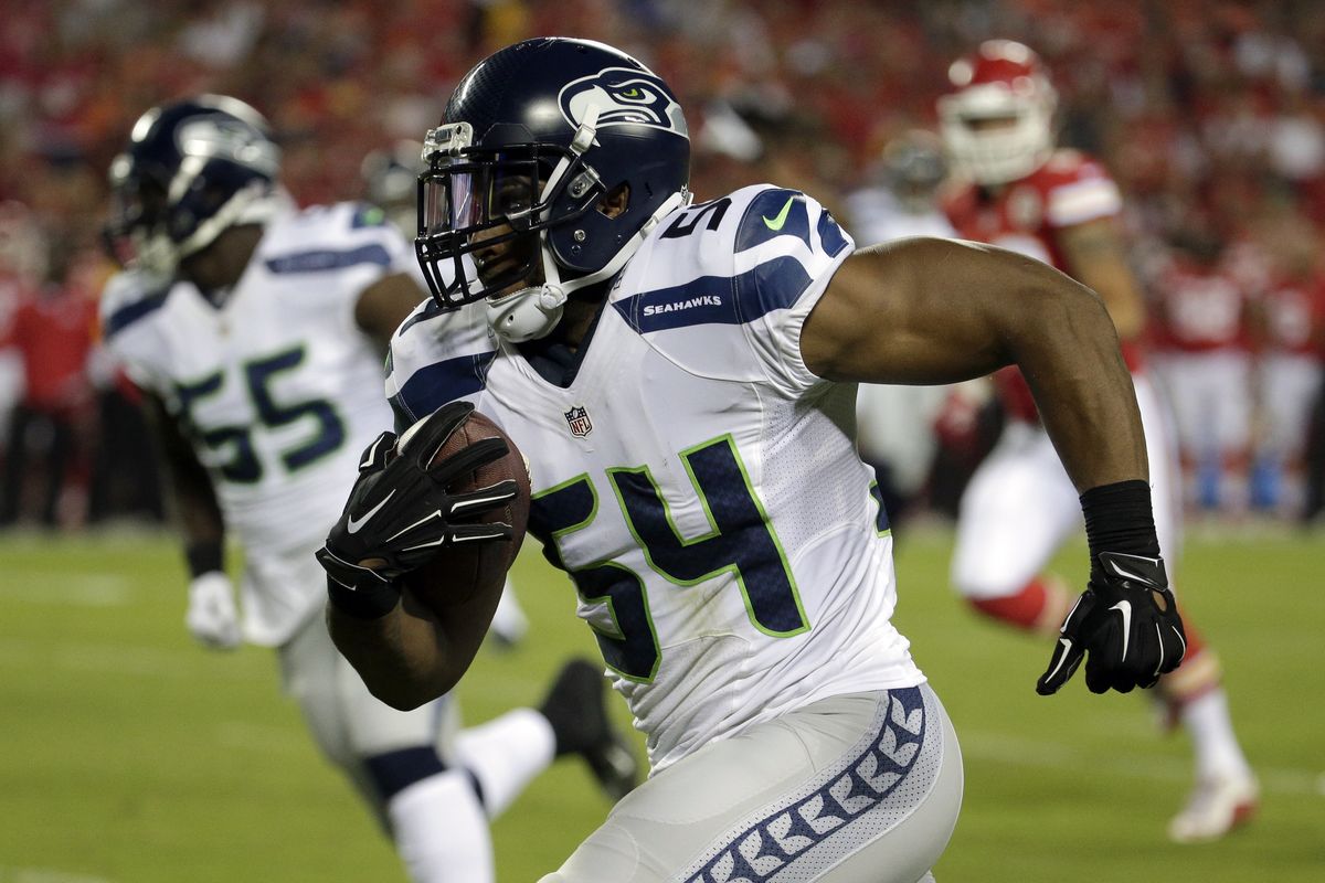 Seahawks middle linebacker Bobby Wagner returns an interception 25 yards for a touchdown after picking off an Alex Smith pass. (Associated Press)