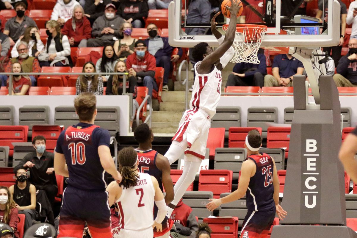 Washington State forward Mouhamed Gueye (35) dunks against Arizona during the first half of an NCAA college basketball game, Thursday Feb. 10, 2022, in Pullman, Wash. (AP Photo/Geoff Crimmins)  (Geoff Crimmins)