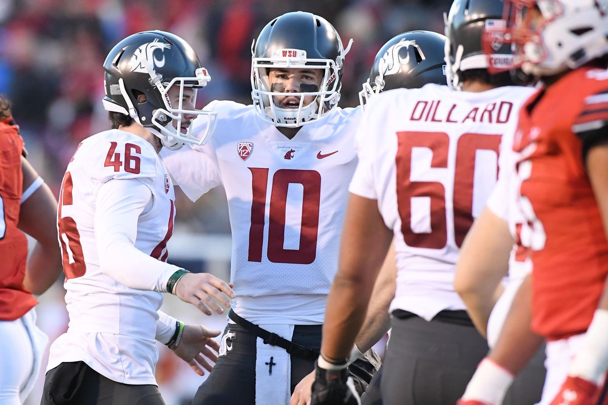 Washington State Cougars place kicker Erik Powell (46) is congratulated after sinking a kick during the first half of a college football game on Saturday, November 11, 2017, at Rice-Eccles Stadium in Salt Lake City, Utah.   Tyler Tjomsland/THE SPOKESMAN-REVIEW (Tyler Tjomsland / The Spokesman-Review)