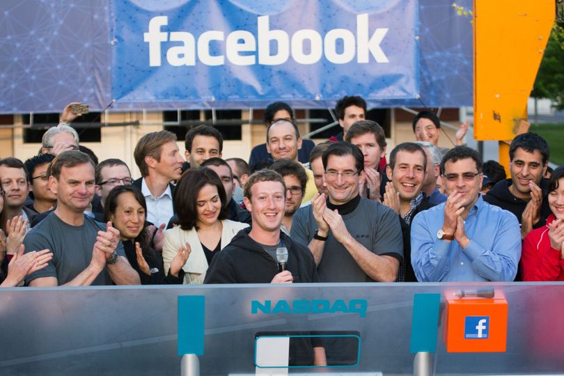 In this May 18, 2012 photo, Facebook founder, Chairman and CEO Mark Zuckerberg, center, rings the opening bell of the Nasdaq stock market, from Facebook headquarters in Menlo Park, Calif. (Associated Press)
