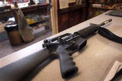 
An AR-15 assault rifle at Brock's Gunsmithing can now have a larger clip than the previous 10 rounds. 
 (Brian Plonka / The Spokesman-Review)